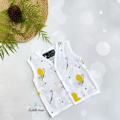 muslin sleeveless jabla with the butterfly print in a flat lay pattern