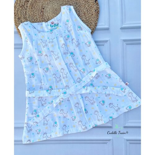 Baby wrap with giraffe pattern on a textured surface