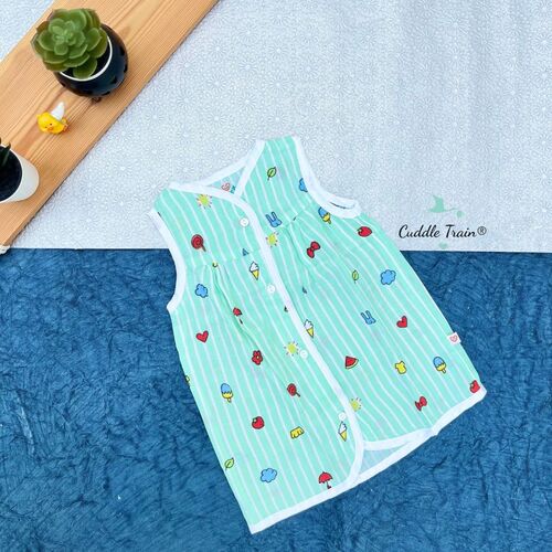 Children's sleeveless dress with colorful patterns on a textured surface