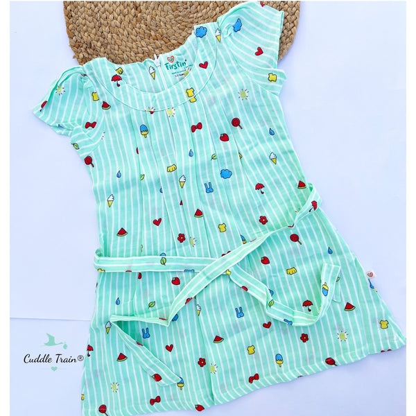 Children's dress with colorful patterns on a light background