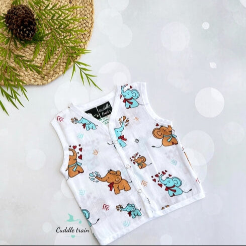 Children's sleeveless tops with elephant pattern on a white surface with decorative elements.