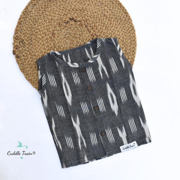 Folded shirt with ikat pattern on a white background