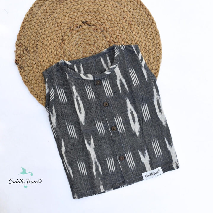 Folded shirt with ikat pattern on a white background