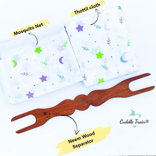 Wooden baby separator with mosquito net, thottil cloth, and neem wood components on a white background.