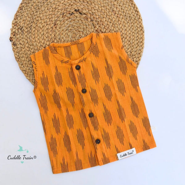 Orange shirt with black patterns on a white background