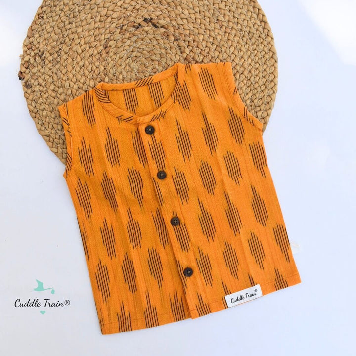 Orange shirt with black patterns on a white background